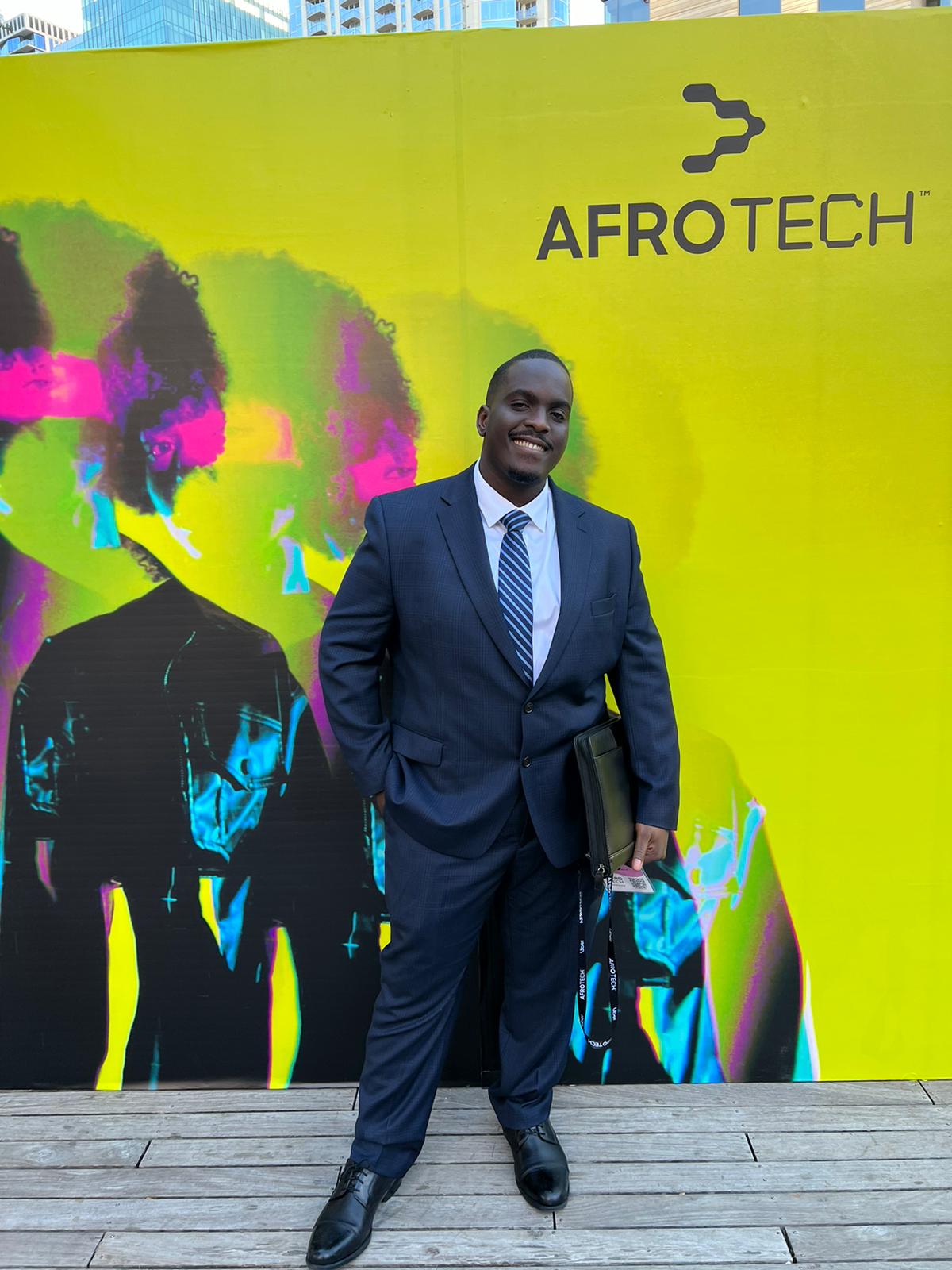 Clinton smiling at AfroTech.